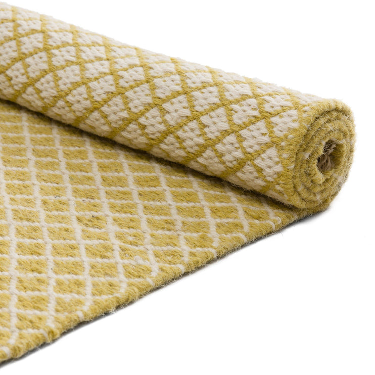 Teppich Loni in Hellgelb & Eierschale aus 100% Wolle | Entdecken Sie unsere schönsten Wohnaccessoires